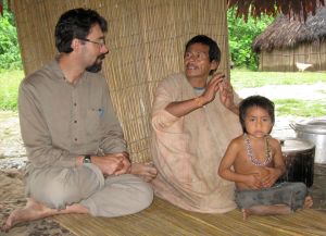 Migero, the leader of the Nanti community of Montetoni, and I collaborate on a video recording for Peruvian government officials (July 2009)